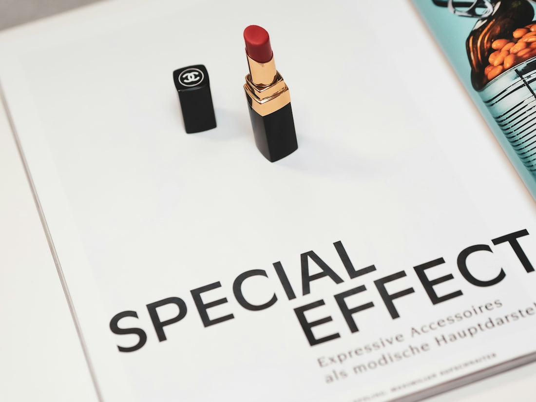 black and red lipstick on white surface