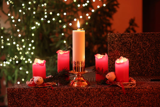 A group of candles sitting on top of a table